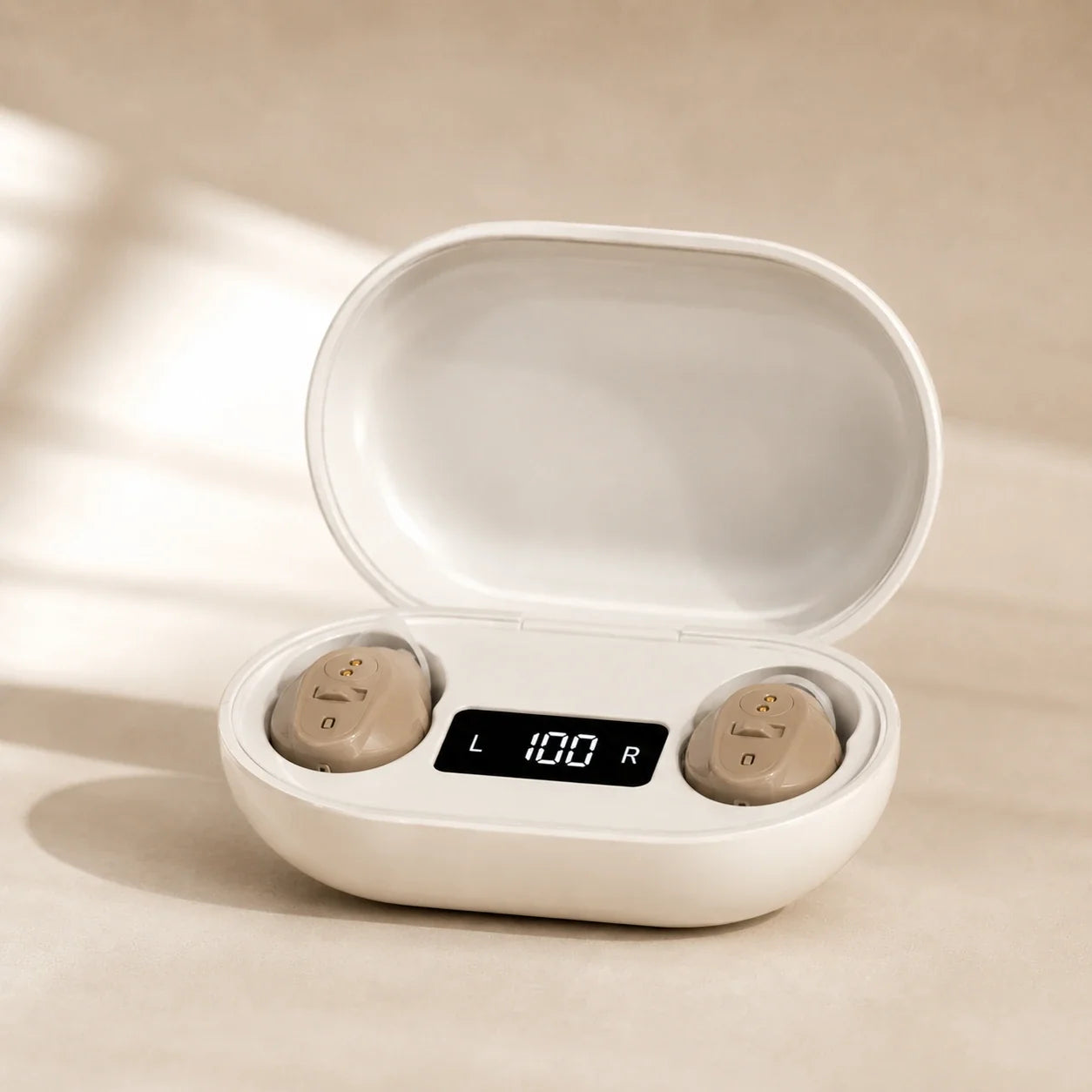 Wireless hearing aids in a white charging case on a beige background